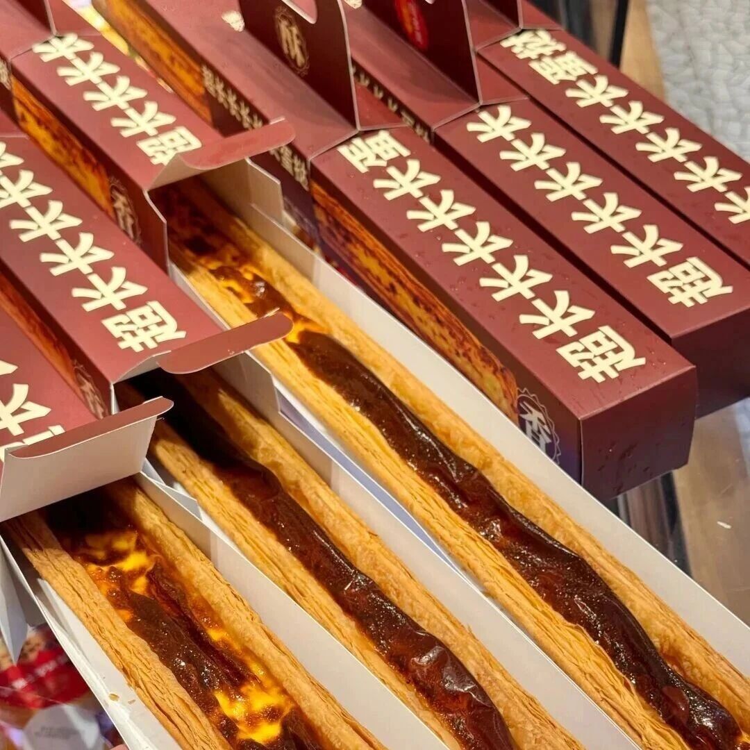 排队1小时、代购收15元，超长蛋挞凭什么让人上头？